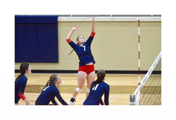 Maegan Anderson goes for a kill during Madisonville’s matchup with Palestine at Leon Thursday. (PHOTO BY) CAMPBELL ATKINS