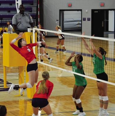 Shelby Remenar in mid-spike during the match against Tatum at the Lufkin Tournament RICHARD SIRMAN