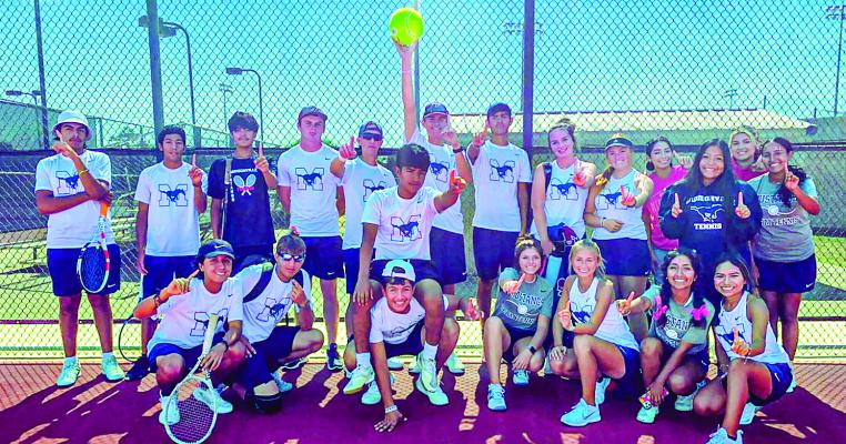 The Mustang Tennis Team at Madisonville High School’s Tennis Complex posing after their victory against Cameron. By Richard Sirman richard.sirman@madisonvillemeteor.com