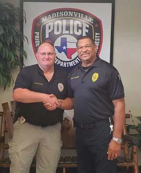 LT William Goodwin (Left) and Chief of Police Herbert Gilbert (right) at the Madisonville Police Department