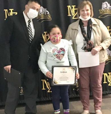 North Zulch ISD Student of the Month Delila Cervantes poses with High School Principal Janie Pope and Assistant Principal Pete Martinez.