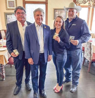 From left to right, Judge Clark Osborne, Congressman Michael McCaul, Veterans Service Officer Erica Greene, and Republican County Chair Kevin Counsil with their United States Congress Patriot Awards. COURTESY PHOTOS