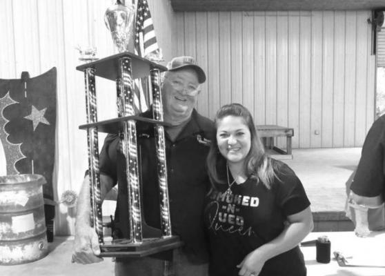 MSCA BBQ Grand Champion Larry Zimmerman and Reserve Champion Vanessa Vela pose together following Saturday’s ceremonies at the MSCA Pavilion. PHOTO BY CAMPBELL ATKINS