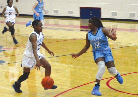 Daiona Johnson drives to the basket during a 2019 home game. Campbell Atkins