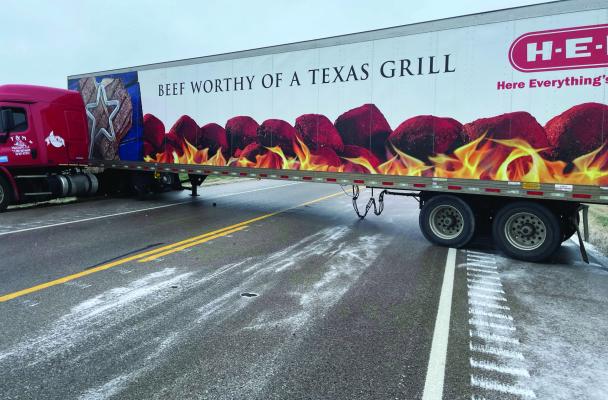 An H-E-B 18-wheeler truck that slid on one of the icy roads in Madison County during the Arctic air surge on Monday, Jan. 15. COURTESY PHOTO