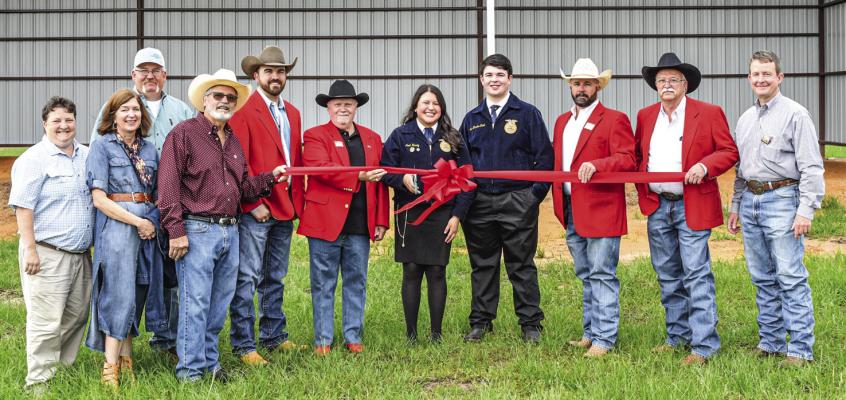 From left to right: Madisonville High School Ag Teach Lynita Foster, Chamber of Commerce's Camilla Viator, MHS Ag Teacher Danny Foster, MSCA Past President Brent Viator, current MSCA President D.L. Shiver, MSCA Past President Dave Ward, FFA Ford Scholar, and founder and creator of Madison County Hay Relief Project Barn: Joeli Hardy, fellow FFA member John Winston Clark, along with MSCA Past Presidents: Matt Clark, Don Shiver and Jay Hardy, on hand for the ribbon cutting ceremonies. COURTESY PHOTO