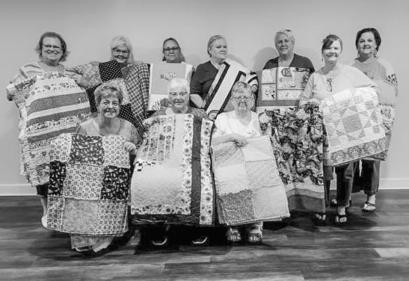 Stitchin Hens &amp; Sew Faithful, both members of the Madisonville Quilting Group, donated 12 quilts to Sleep in Heavenly Peace, Madisonville Chapter. Sleep in Heavenly build beds for children in need. COURTESY PHOTO