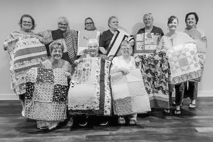 Stitchin Hens &amp; Sew Faithful, both members of the Madisonville Quilting Group, donated 12 quilts to Sleep in Heavenly Peace, Madisonville Chapter. Sleep in Heavenly build beds for children in need. COURTESY PHOTO