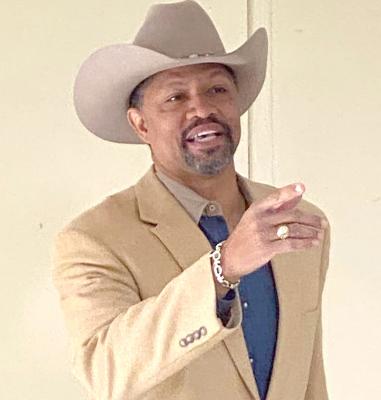 COOPER VISITS MADISONVILLE