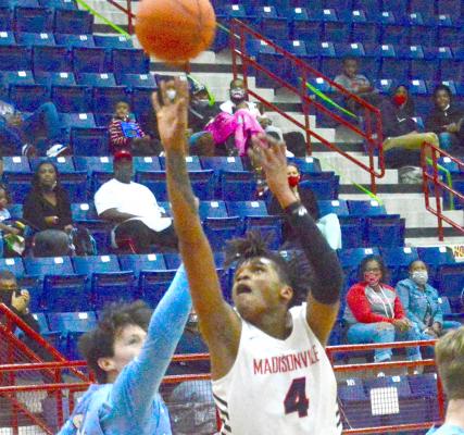 Madisonville’s Casey Holiday attempts a shot during the team’s 62-55 loss to China Spring at MHS Feb. 2. CAMPBELL ATKINS