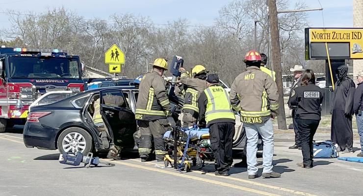 Emergency personnel stage a mock accident at NZHS March 9. COURTESY PHOTOS