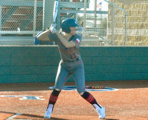 Madisonville’s Jenna Yeager awaits a pitch during a Lady Mustangs home game at MHS. CAMPBELL ATKINS