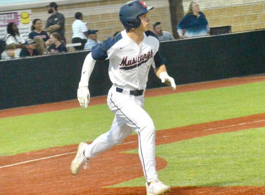 Madisonville’s Trent Murphy runs to first base during a Madisonville home game. CAMPBELL ATKINS