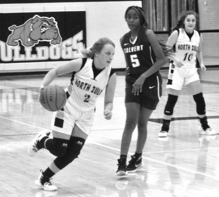 Lady Dogs cruise to district wins