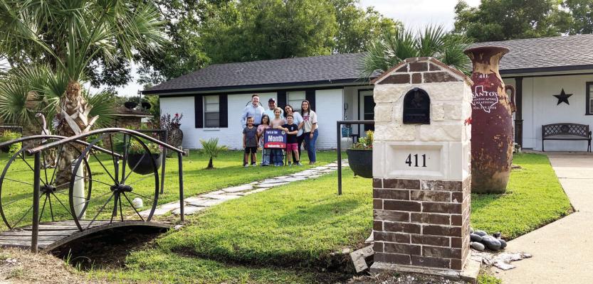 COURTESY PHOTOS Santos and Leticia Munoz of 411 N. Commerce St. were recognized with the City of Madisonville’s August Yard of the Month award. Their well-kept lawn and landscaping reflect the homeowners’ hard work, pride, and dedication, adding beauty to both their property and the surrounding neighborhood.