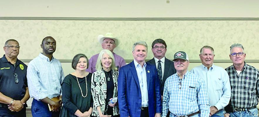 Congressman Michael McCaul at the Truman Kimbro Center on Thursday, November 3 with various city and county officials of the City of Madisonville and Madison County