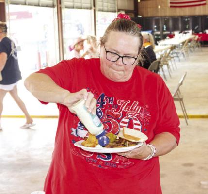 A COMMUNITY FILLS THE FIREHOUSE