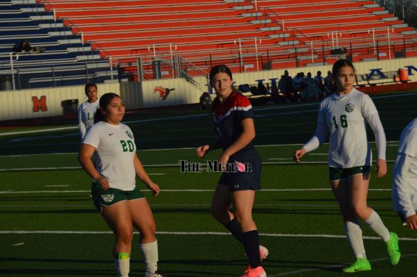 Madisonville freshman Arianna Nacianceno celebrates after scoring one of her goals during Friday's match against Livingston at Mustang Stadium. The striker has netted 47 goals this season, setting a new school record. 