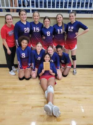 Lady Mustangs Spike Palestine in District Opener