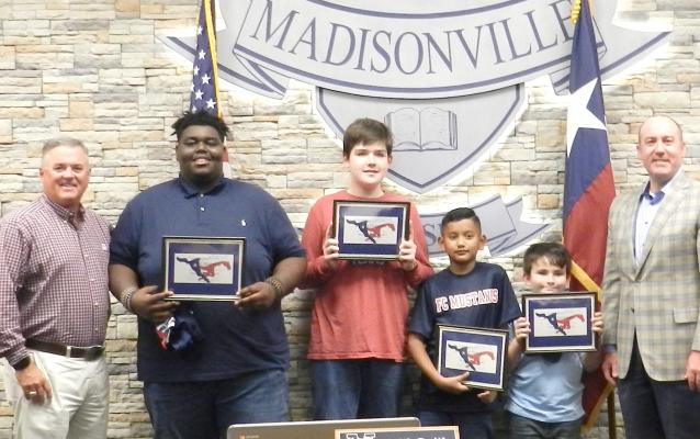 Superintendent Keith Smith and board member Dale Hurst pose with the MCISD Students of the Month for October. The students are (pictured, from left) Hillard Morning, Jayden Driggers, Anthony Penaloza and Gracer Lechinger. COURTESY PHOTOS