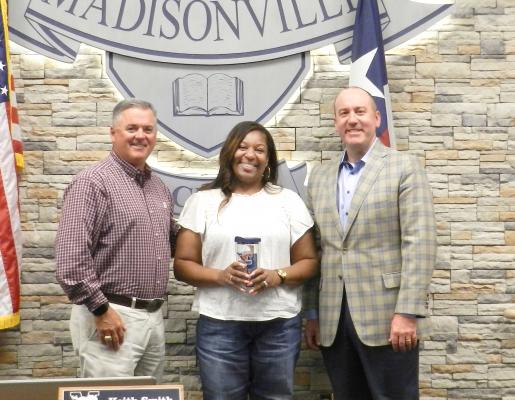 Superintendent Keith Smith and board member Dale Hurst pose with MCISD Employee of the Month Shawnique Cooper. (Not pictured: Employee of the month Karina Torres) COURTESY PHOTOS