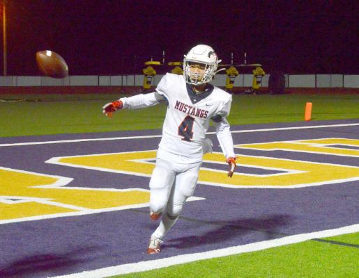 Jermal Holland flips the ball to the referee after stripping Center’s J.T. Davis and returning it for a touchdown Friday CAMPBELL ATKINS