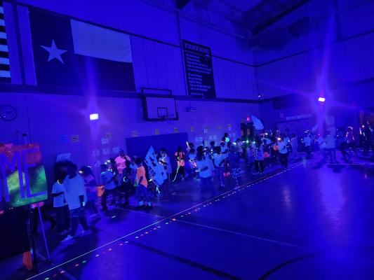 MIS STUDENTS RAISE $30,000 IN GLOW RUN