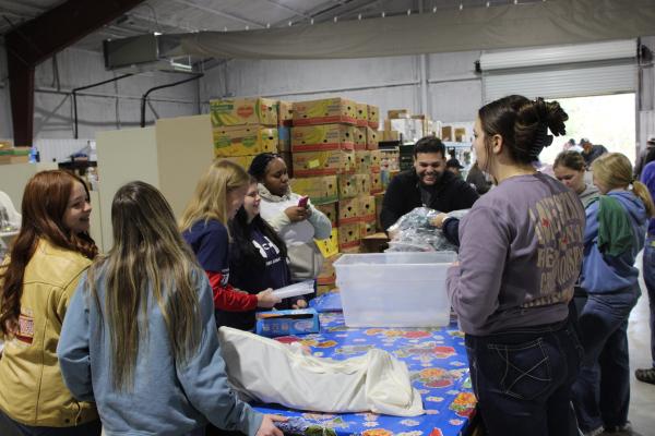 Students Unite for SonShine Food Drive Success 