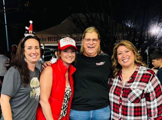 From left, Karen Tedder, Brooke Willis, Mustang Head Band Director 