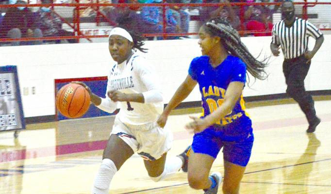 Kayla Dickey drives to the basket at MHS last season. CAMPBELL ATKINS
