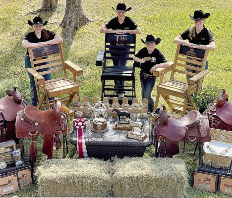 Pictured left to right is Harper Nash, Courtney Hammit, Channing Allen and Addison Allen as they pose with some of the awards they have won over the last year from the TQHYA and the AQHYA. The girls’ excellence in their sport has brought even more notoriety to Madisonville, Texas in the equestrian world.