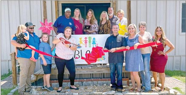 Madison County Chamber of Commerce celebrated a ribbon cutting for Bloomer Learning Academy Tues., Aug. 29. Owners of Bloom Learning Academy Kris and Lacy Kelso with the daycare director Jolee Midkiff, and members of the chamber of commerce and community attended the ceremony. COURTESY PHOTO