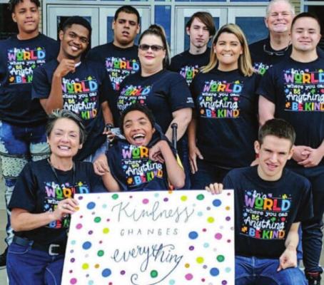 Members and teachers of Madisonville High School’s Life Skills class pose together during Autism Awareness Week, April 18-22. COURTESY PHOTO
