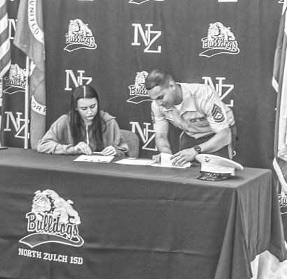 North Zulch senior Cianny Batres began the process of her commitment to the United States Marine Corps. COURTESY PHOTO