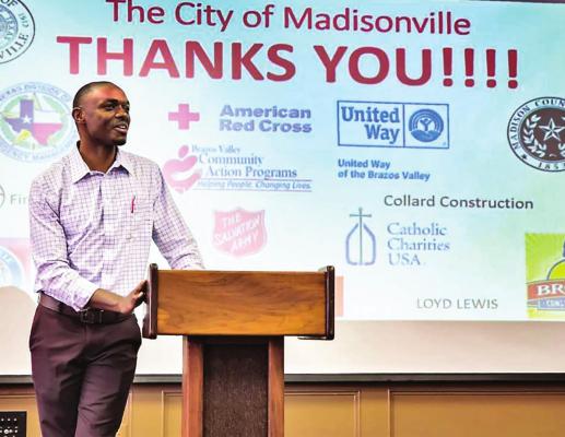 Madisonville City Manager Fabrice Kabona addresses city employees attending a luncheon in their honor recently held at the Kimbro Center. MELISSA HINOJOSA