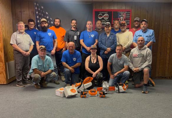 Members of the North Zulch Volunteer Fire Department pose with new Stihl battery- powered saws and equipment donated by Blue Mountain Equipment of McKinney. Tyler Sunday, a commercial services specialist, and territory manager Lee Goehring coordinated the donation with the help of Madisonville Ace Hardware management. COURTESY PHOTO