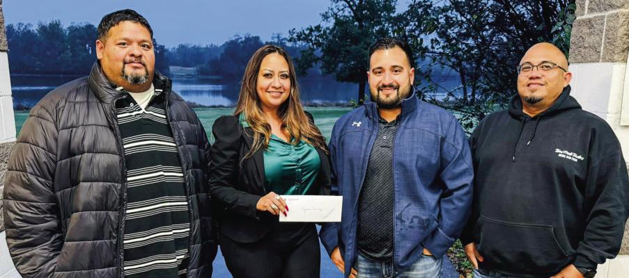 Josué Chavez was the winner of the 50/50 raffle hosted by the Hispanic Heritage Association (HHA) of Madisonville. All proceeds benefit the foundation for future way to give back t to the local community. Pictured, left to right: HHA Vice President Oliver Juarez, HHA President Zoraida Garcia, Josué Chavez, and HHA Board Member Jesus Nacianceno Jr. COURTESY PHOTO