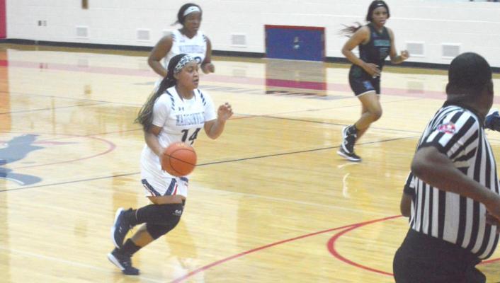 Makayla Ford drives to the basket during a Lady Mustangs home game at MHS. CAMPBELL ATKINS