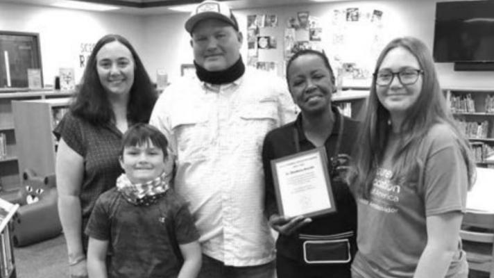 Dr. Rhodena and Stacy Fowler pictured with Fowler’s parents, Greg and Marcy, and younger brother David.