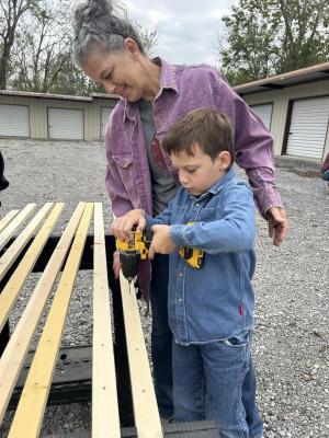 HELPING BUILD BEDS