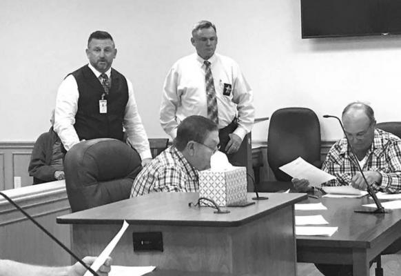 Madison County Sheriff Bobby Adams and Chief Deputy Steven Jeter discuss the need for upgraded body cameras for Sheriff Deputies at Monday’s Commissioners Court meeting. CAMPBELL ATKINS