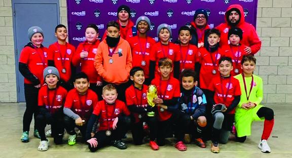 At the 2024 Aggieland Classic held on Friday, Jan 19, through Sunday, Jan 19, the FC Mustangs had two teams that participated in the gold bracket, the highest level of the competition and both teams came away with championship trophies. The U11 team is in red and black, while the U12 team is in red and white. COURTESY PHOTOS