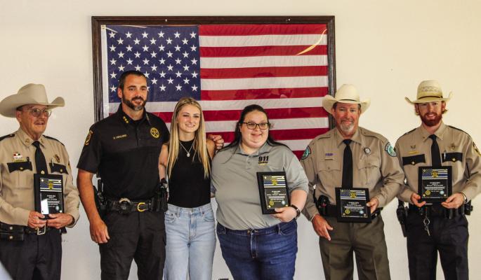 From left to right, Deputy John Kindon, Chief Deputy Montogomery County Precinct 5 Constable Chad Walling, Rachel Walling, Dispatcher April “Nikki Roberts, Texas Parks and Wild Life Game Warden, Chris Lasiter, and Deputy Wyatt Faulkner