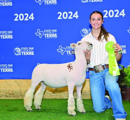 Emillie Harrison stands with her market lamb that placed 7th in the Medium Weight Division at the Heart O’ Texas Livestock Show and Rodeo. COURTESY PHOTOS