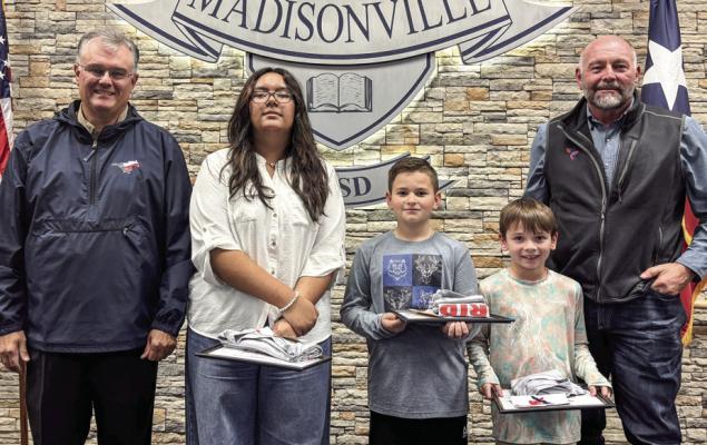 Student honorees (from left): Yesenia Robles, Logan Clary &amp; Rhett Dartez display their Student of the Month awards for February. Not pictured: Deruise Johnson. COURTESY PHOTOS