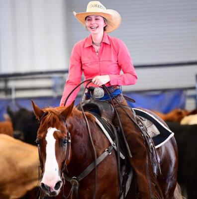 Faith Farris riding on her horse
