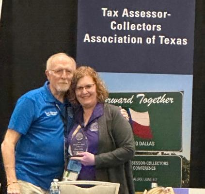 President Stidham (left) and Karen Lane (left) holding her award