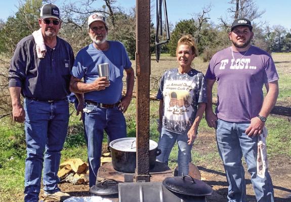 Pictured from left to right, Jason Batson, Charles Cook, Kim Trapolino, and Charlie Cook at the Chuck Wagon Cook-off.