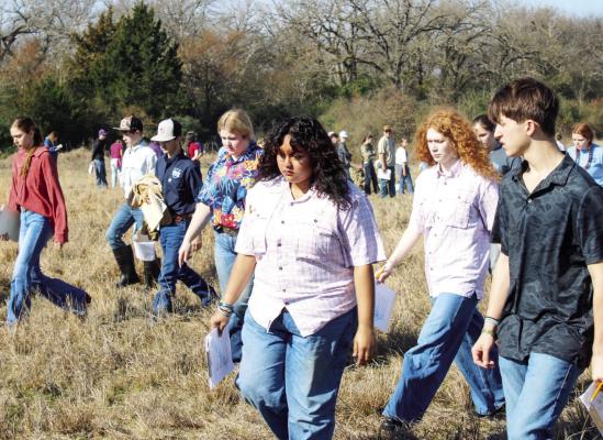 Students evaluate soil and terrain during the Bedias Creek Soil and Water Conservation District Annual Land, Homesite and Rangeland Contest on Wednesday, Feb. 12. METEOR PHOTOS BY RICHARD SIRMAN