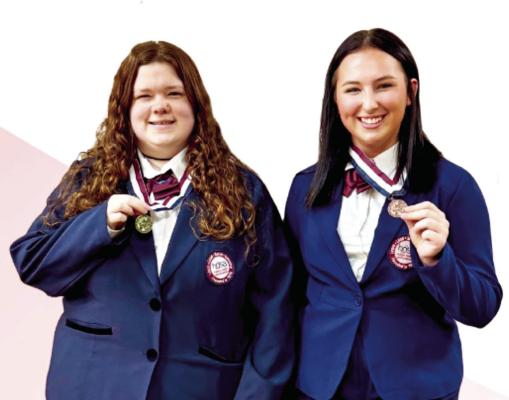 PHOTO COURTESY OF NORTH ZULCH INDEPENDENT SCHOOL DISTRICT North Zulch High School students Kandice Luscomb (left) and Zailey Crocker display their medals from the HOSA Spring Leadership Conference. Luscomb took first place in Personal Care and Crocker finished third in Job Seeking Skills. Both will compete at the Texas HOSA State Leadership Conference. Kelly Weiler serves as the chapter’s advisor.